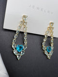 AndQ Blue Transparent Zircon Embedded Heart Earrings