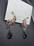 AndQ Zircon Embedded Wings Tassel Earrings