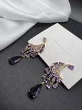 AndQ Zircon Embedded Wings Tassel Earrings